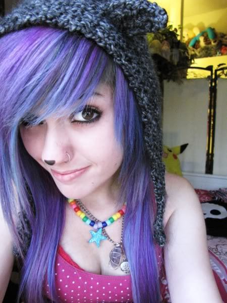 Black hair with purple tips & blue eyes.